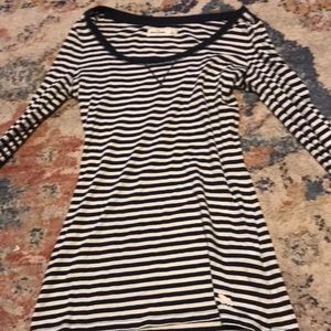 Two shirts one is black one is black and white
